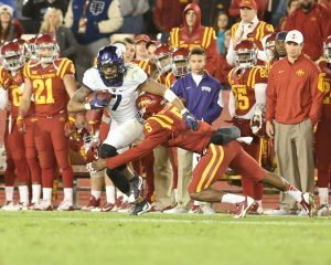 Oct 17, 2015; Ames, IA, USA; Iowa State Cyclones defensive back Kamari Cotton-Moya (5) tackles TCU Horned Frogs wide receiver Kolby Listenbee (7) during the fourth quarter at Jack Trice Stadium. The Horned Frogs beat the Cyclones 45-21. Mandatory Credit: Reese Strickland-USA TODAY Sports
