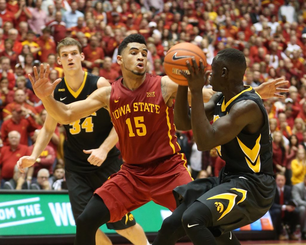 Dec 10, 2015; Ames, IA, USA; Iowa State Cyclones guard Nazareth Mitrou-Long (15) defends Iowa Hawkeyes guard Peter Jok (14) at James H. Hilton Coliseum. The Cyclones beat the Hawkeyes 83-82. Mandatory Credit: Reese Strickland-USA TODAY Sports