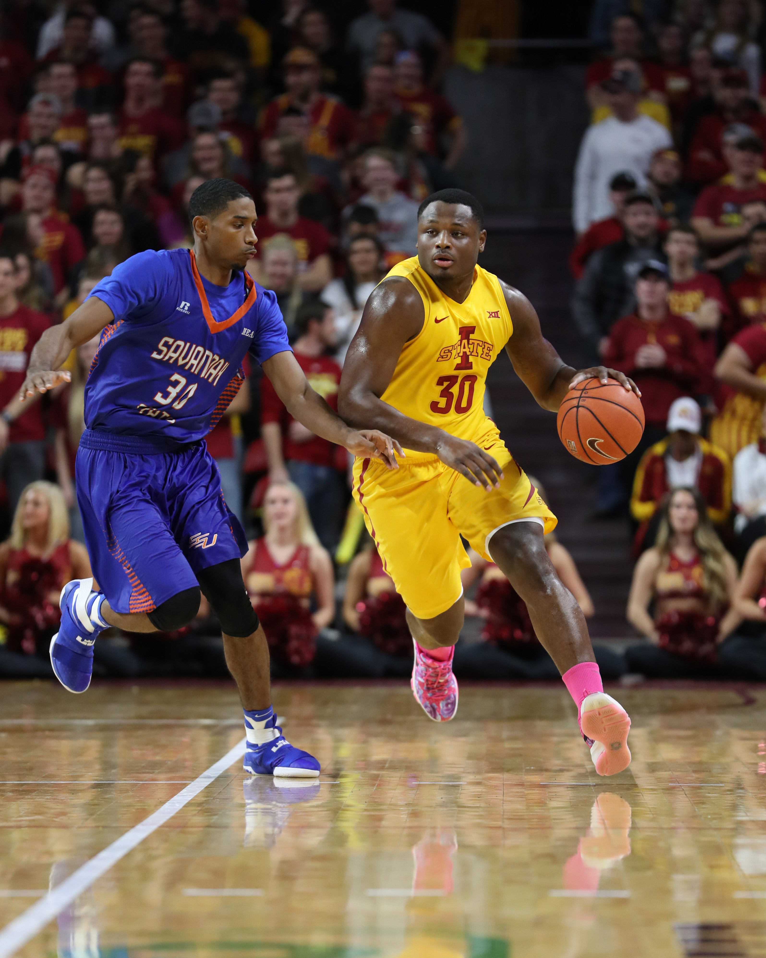 Nov 11, 2016; Ames, IA, USA; Iowa State Cyclones guard Deonte Burton (30) is defended by Savannah State Tigers guard Jahir Cabeza (30) at James H. Hilton Coliseum. Mandatory Credit: Reese Strickland-USA TODAY Sports