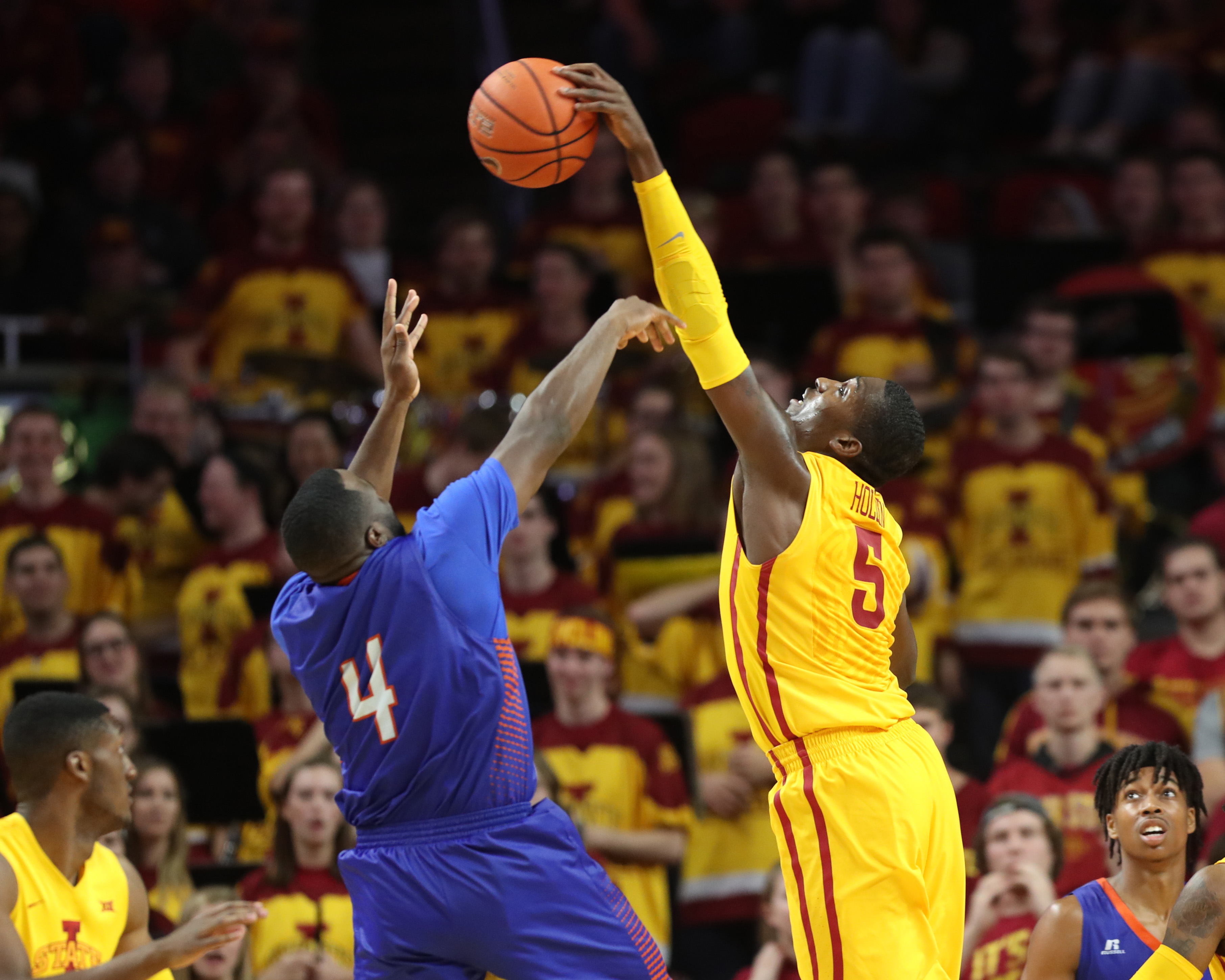 Nov 11, 2016; Ames, IA, USA; Iowa State Cyclones forward Merrill Holden (5) blocks the shot of Savannah State Tigers guard Troyce Manassa (4) at James H. Hilton Coliseum. The Cyclones beat the Tigers 113-71. Mandatory Credit: Reese Strickland-USA TODAY Sports