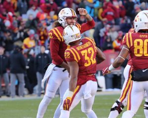 Nov 19, 2016; Ames, IA, USA; Iowa State Cyclones quarterback Jacob Park (10) celebrates with Iowa State Cyclones running back David Montgomery (32) after he scores a touchdown against the Texas Tech Red Raiders at Jack Trice Stadium. Mandatory Credit: Reese Strickland-USA TODAY Sports