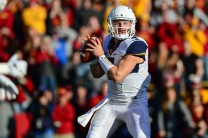 Nov 26, 2016; Ames, IA, USA; West Virginia Mountaineers quarterback Skyler Howard (3) looks to pass against the Iowa State Cyclones during the first quarter at Jack Trice Stadium. Mandatory Credit: Jeffrey Becker-USA TODAY Sports