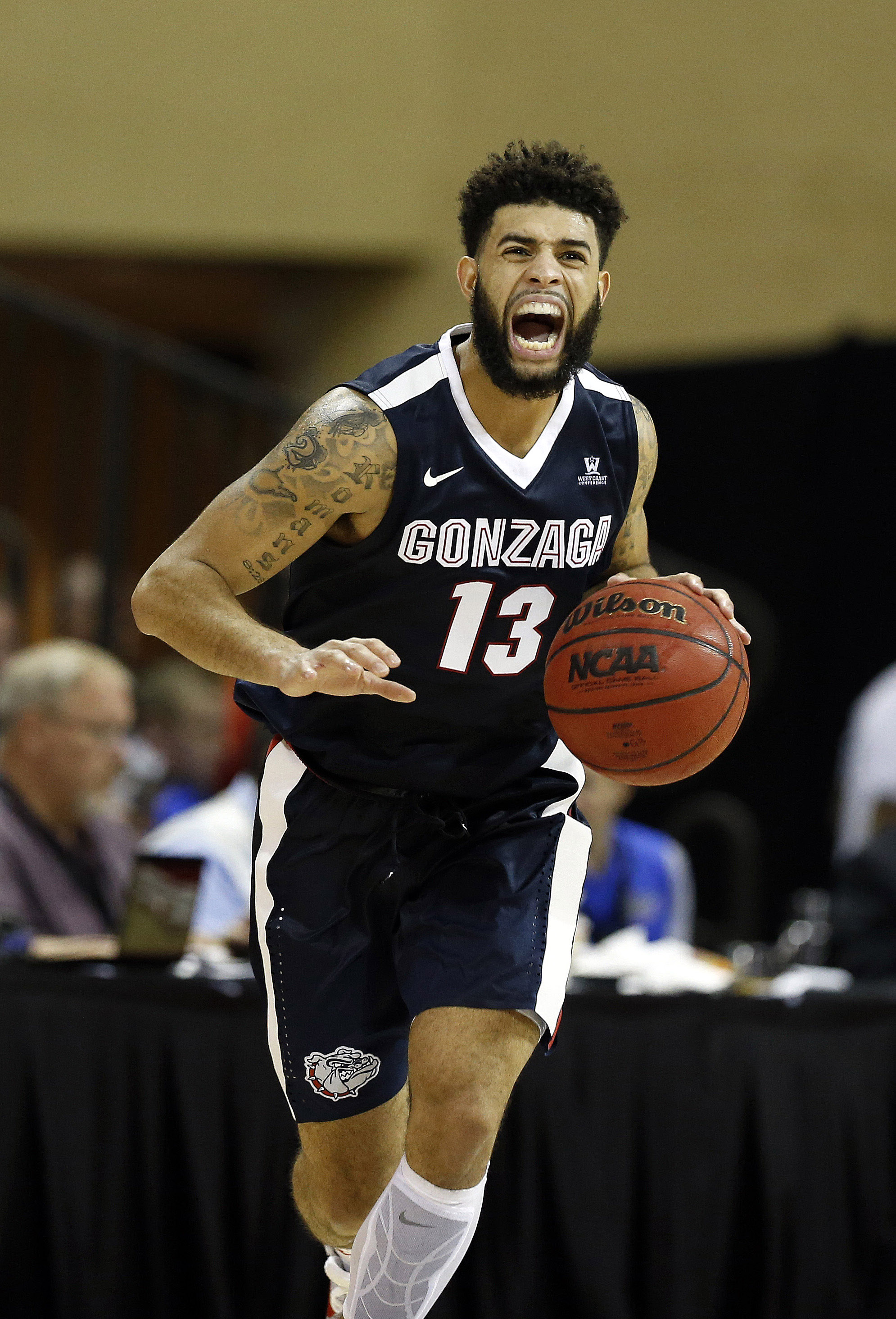 Nov 24, 2016; Kissimmee, FL, USA; Gonzaga Bulldogs guard Josh Perkins (13) drives to the basket against the Quinnipiac Bobcats during the second half at HP Field House. Gonzaga Bulldogs defeated the Quinnipiac Bobcats 82-62. Mandatory Credit: Kim Klement-USA TODAY Sports