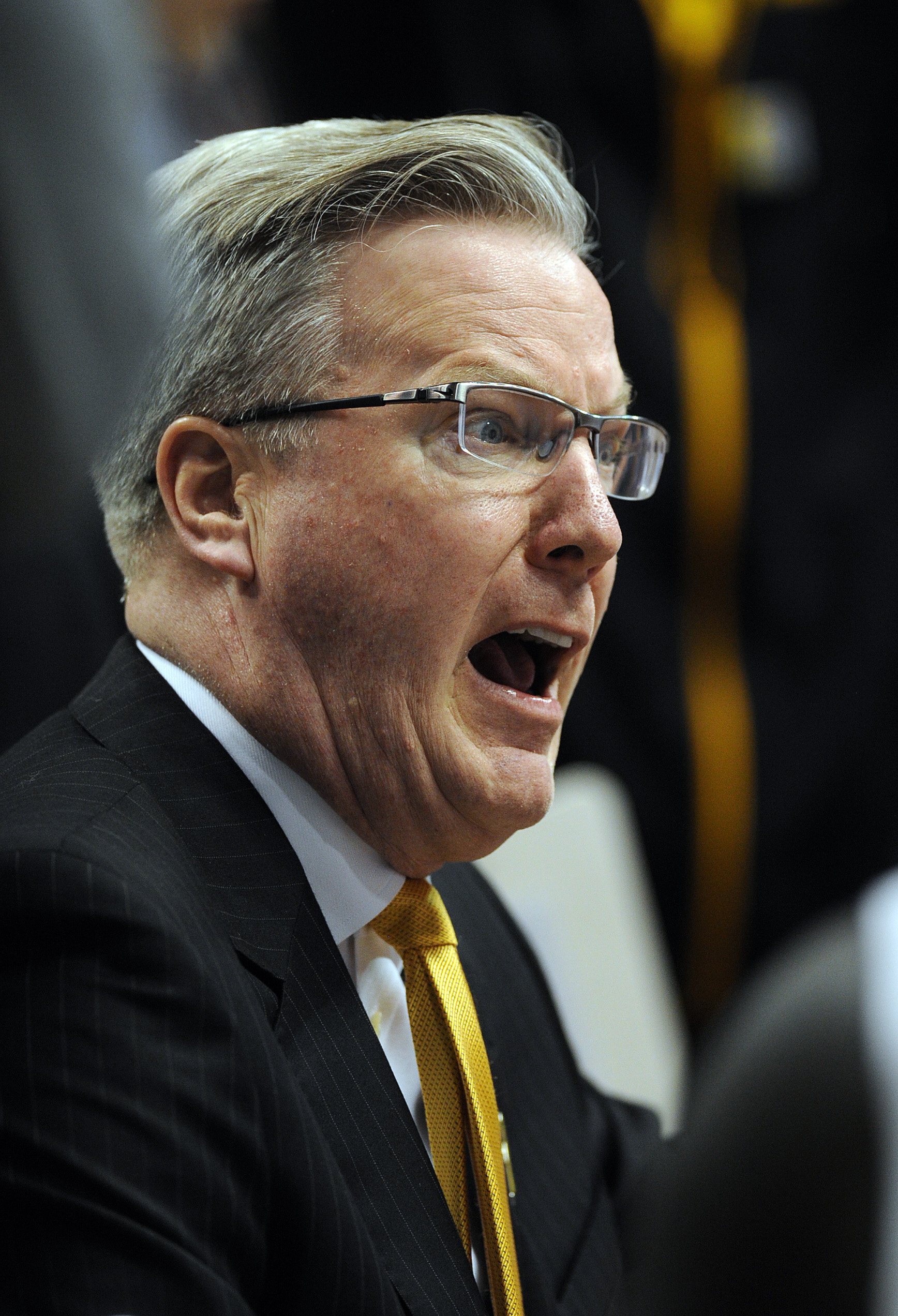 Mar 10, 2016; Indianapolis, IN, USA; Iowa Hawkeyes head coach Fran McCaffery yells at his players in a huddle during a first half timeout against the Illinois Fighting Illini during the Big Ten Conference tournament at Bankers Life Fieldhouse. Mandatory Credit: Thomas Joseph-USA TODAY Sports
